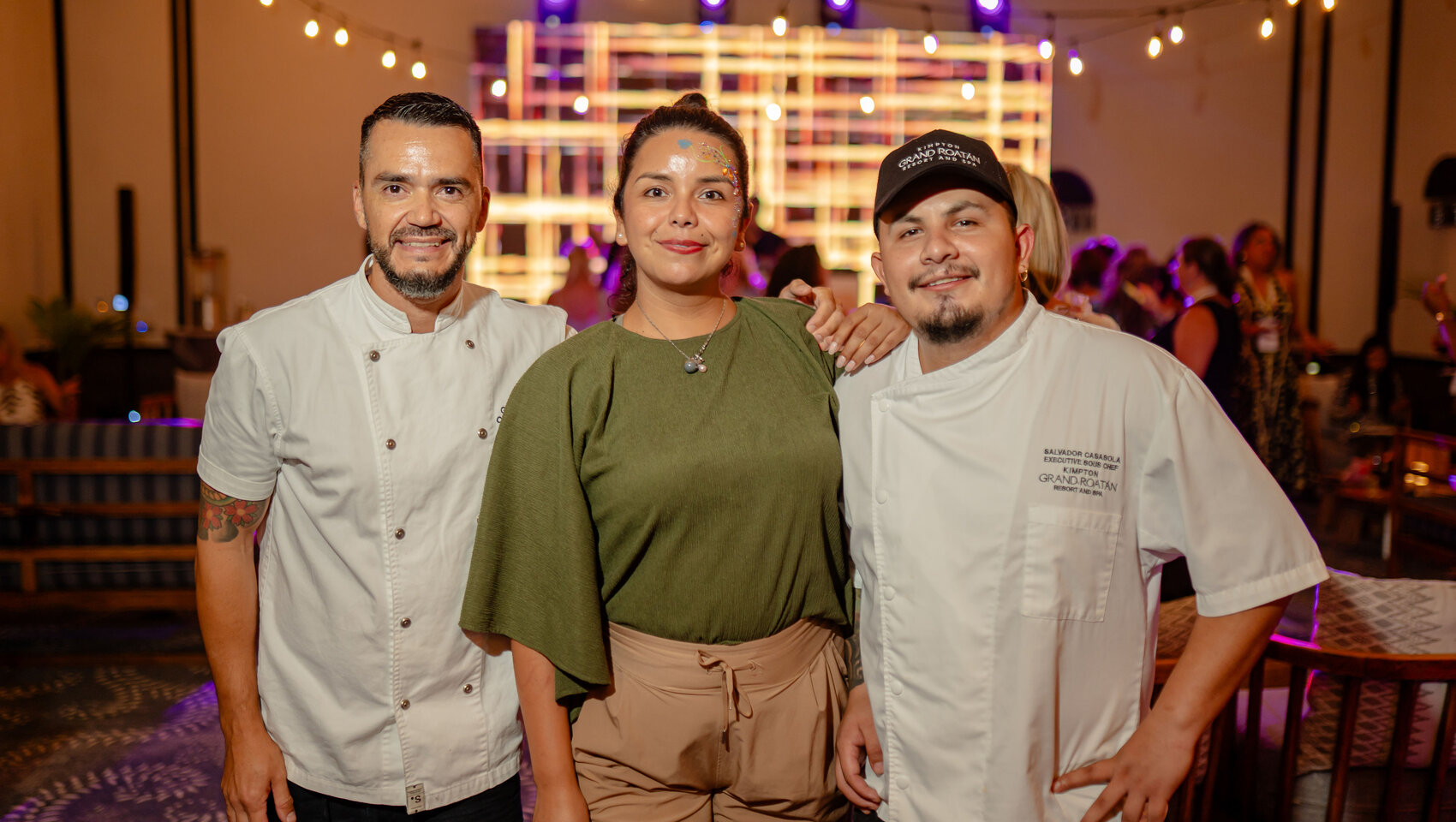 Guest with chefs at Beer Festival at Grand Roatan