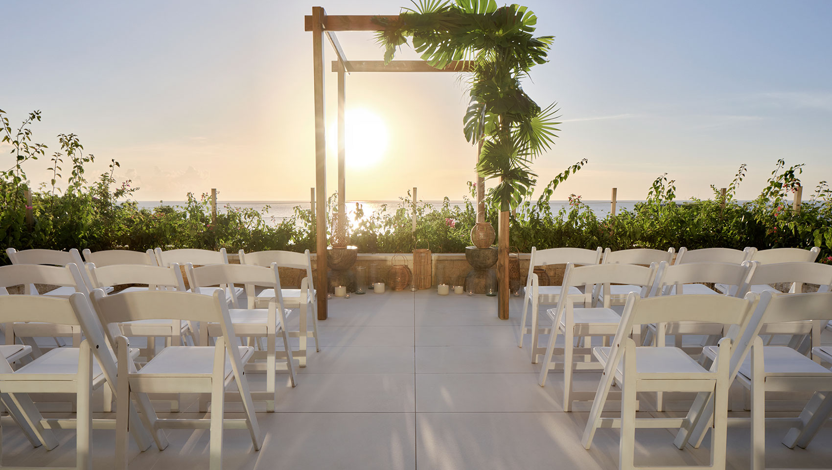 Wedding patio with full view overlooking ocean at sunset
