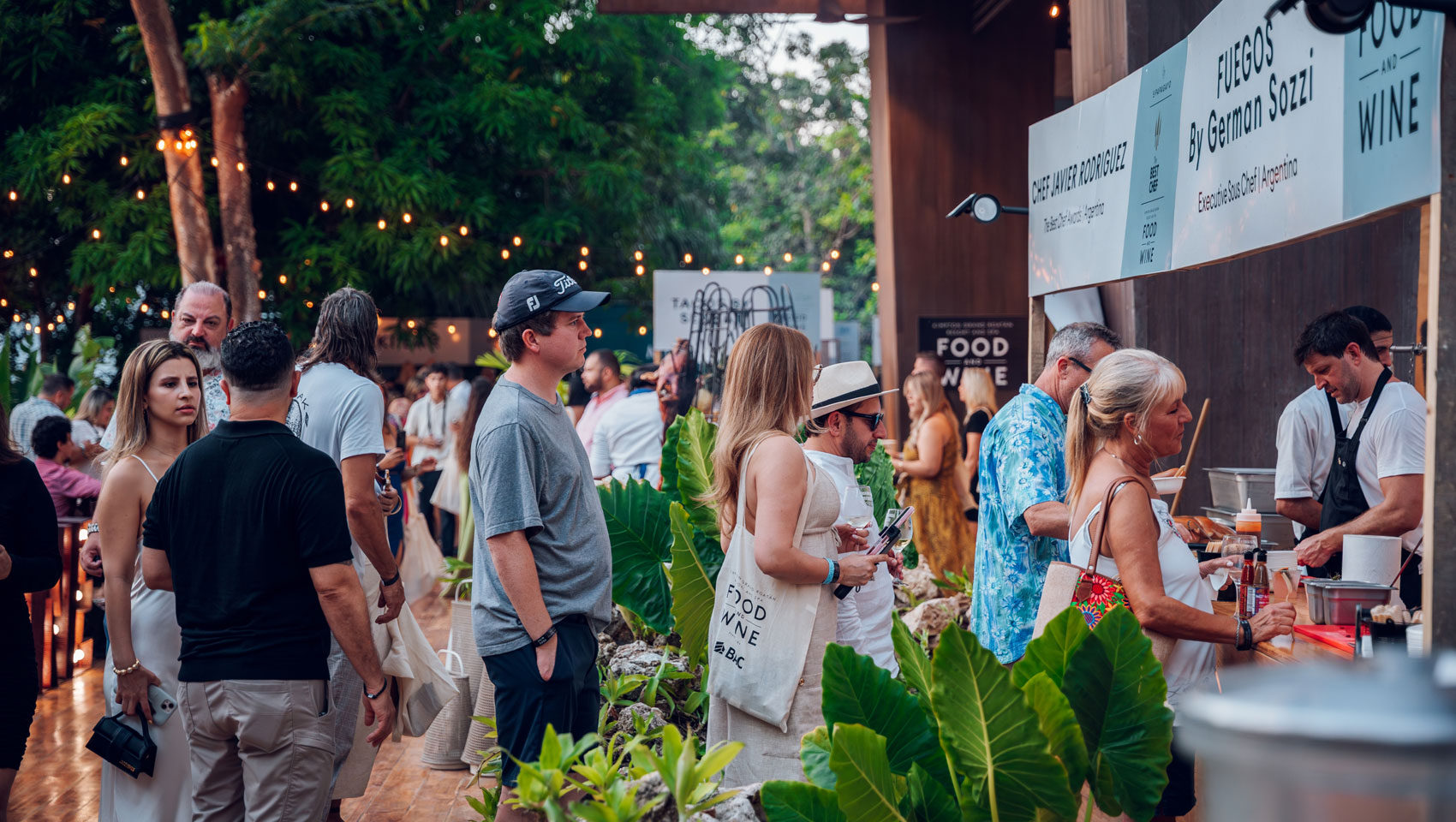 Guests wait for food at Grand Roatan Food & Wine Festival
