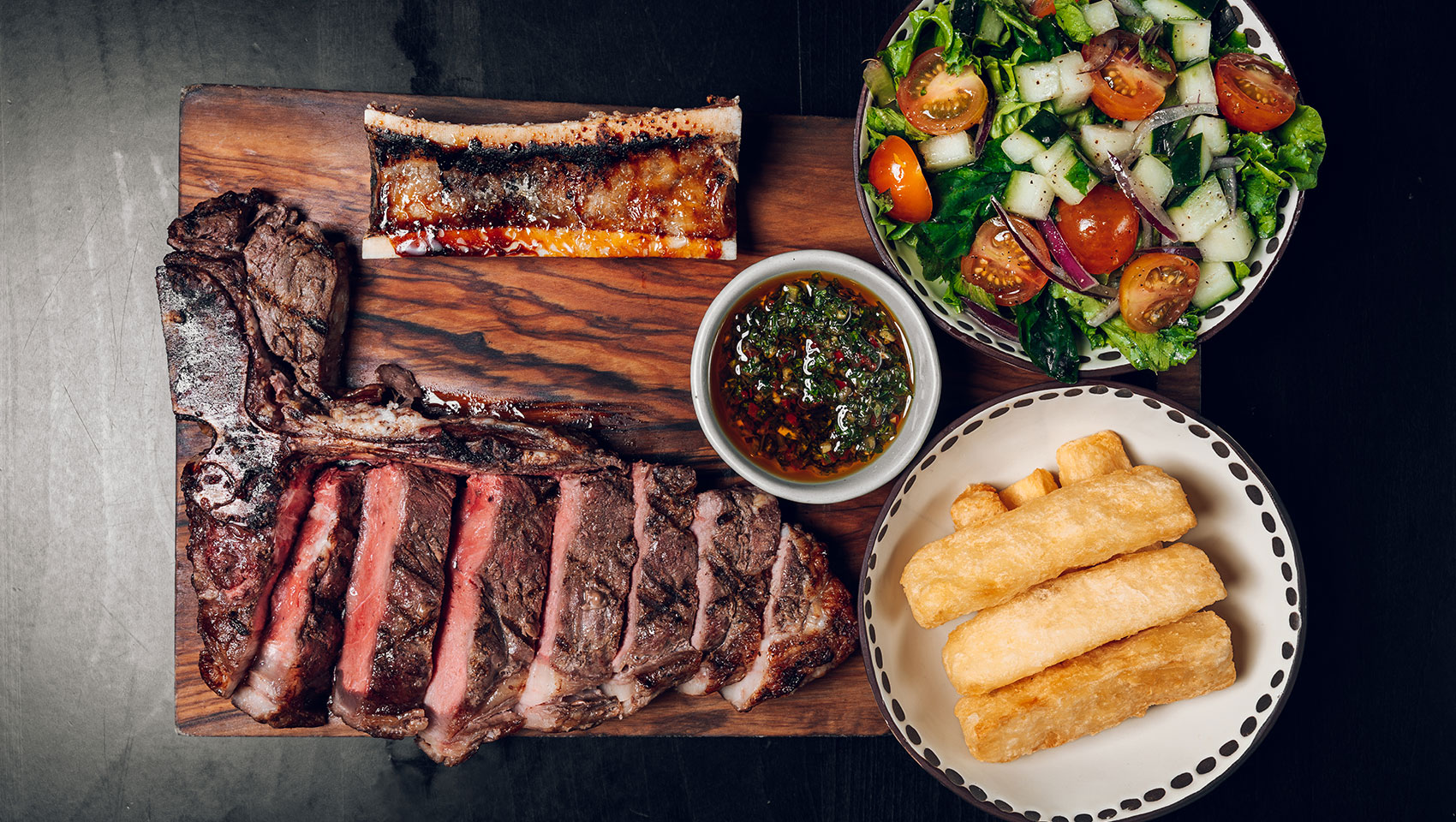 Aerial of steak meal at Kimpton Grand Roatan