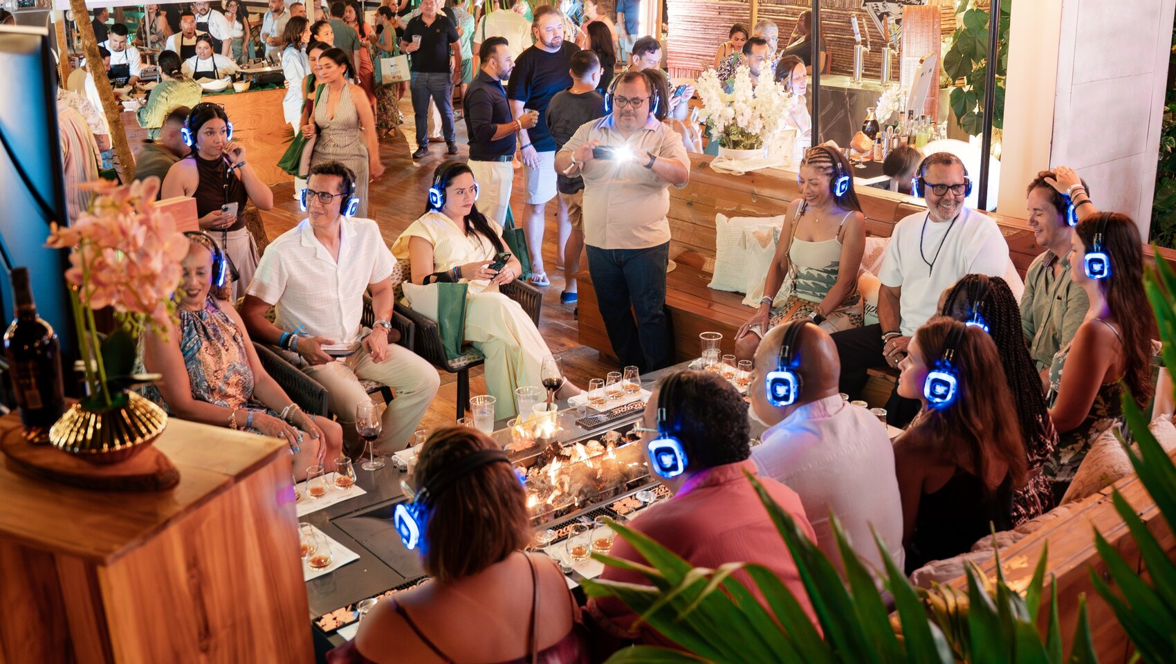 Guests enjoy a special audio experience at Grand Roatan Food & Wine Festival