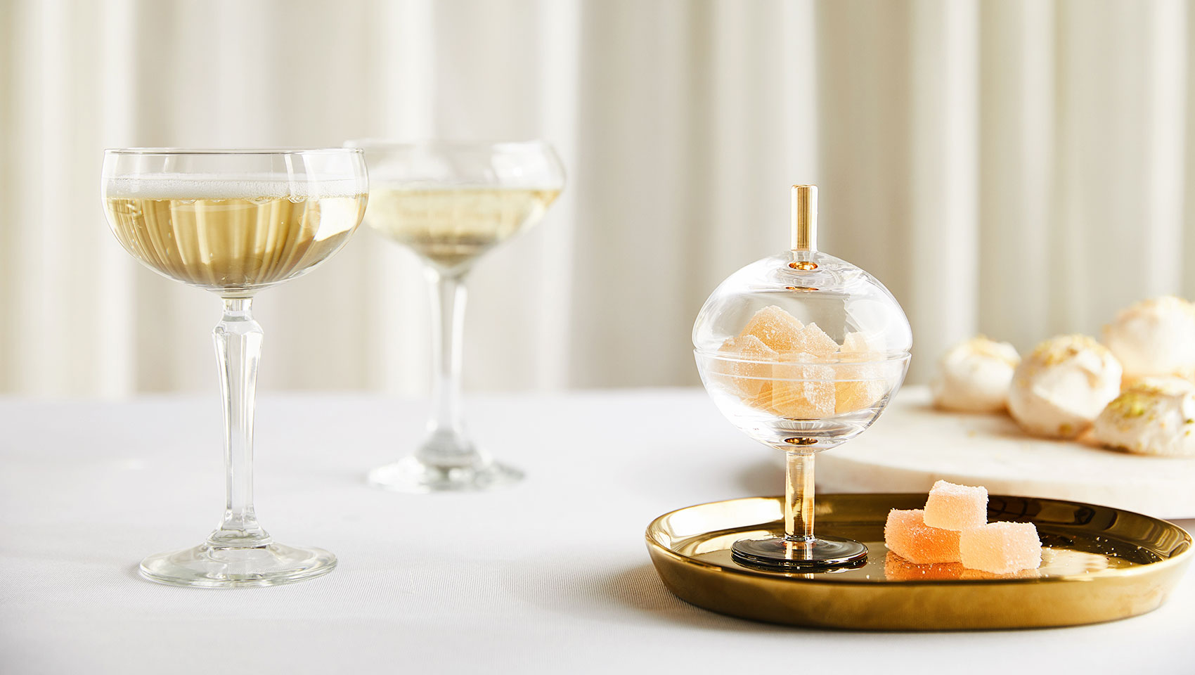 Champagne coupes and sweets