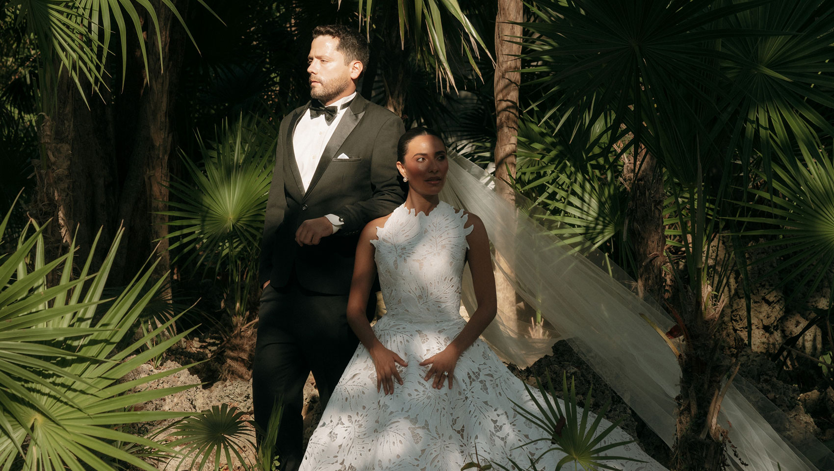 Bride and groom in the trees at Kimpton Grand Roatan