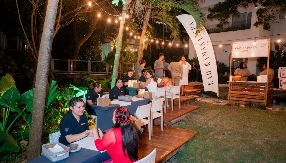 guests receive treatments in relax and restore lounge at Roatan at Food & Wine Festival
