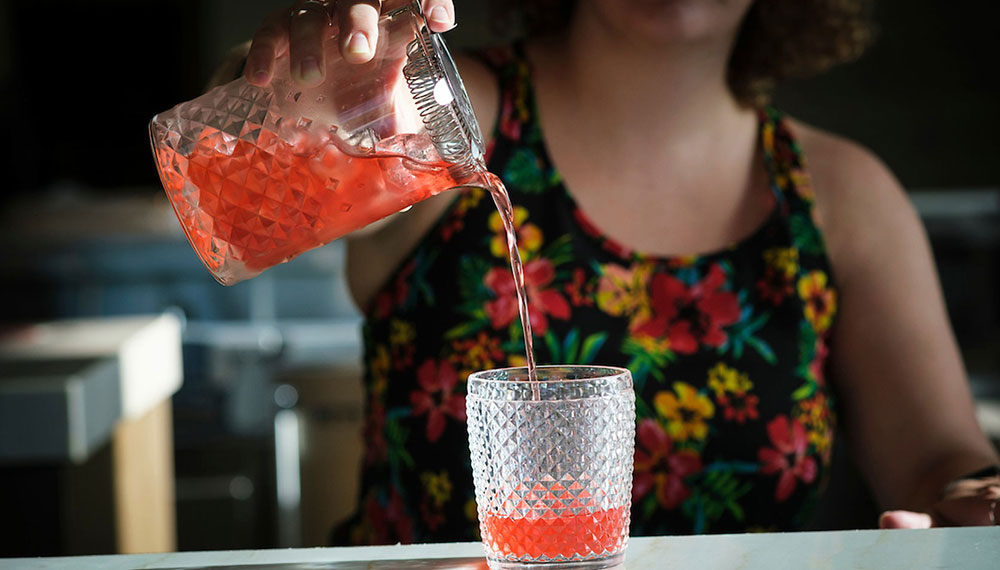 Image of cocktail being poured at Vos