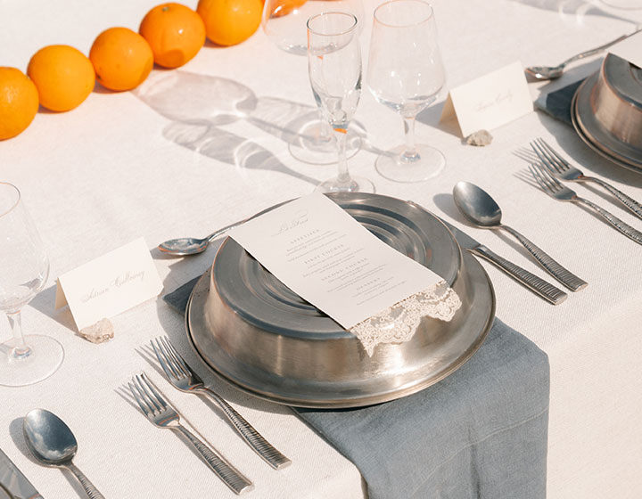 Reception Table set-up with oranges as decor at Kimpton Grand Roatan