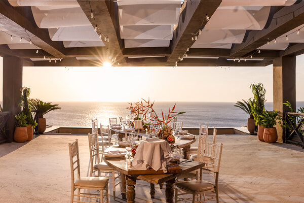 special dining set up on Bêyabu Rooftop at Kimpton Grand Roatan