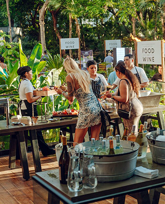 Women sampling at Grand Roatan Food & Wine Festival