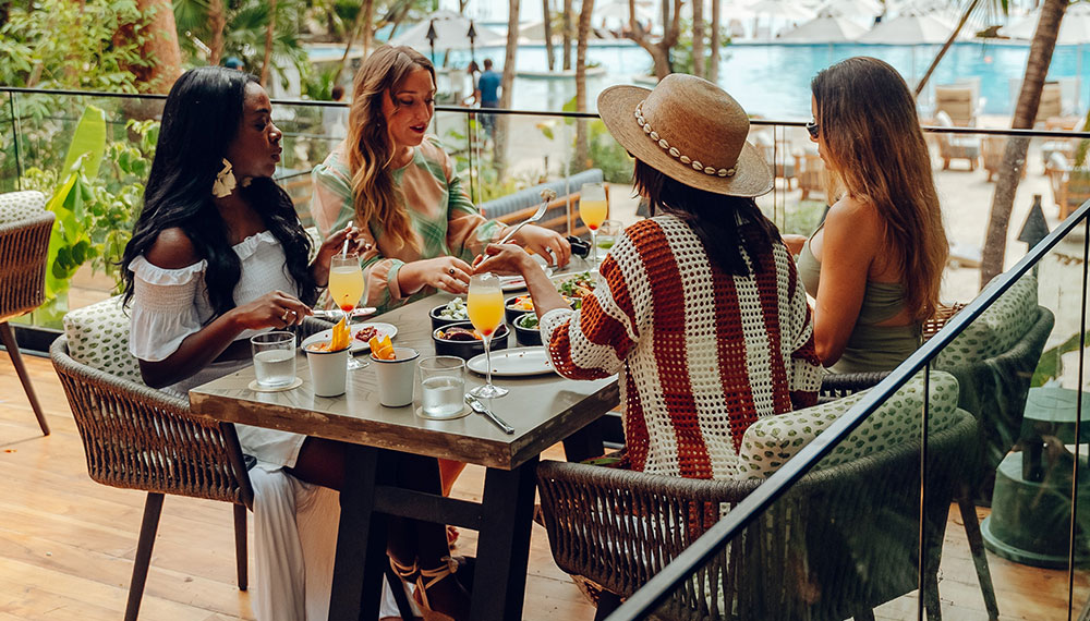 Women enjoying brunch at Alera on the outdoor terrace