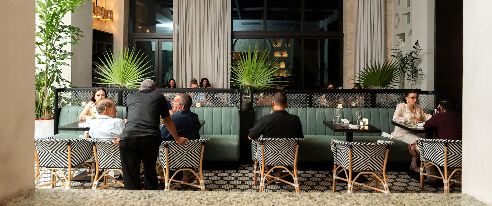 Guests at Alera speaking  with the Chef