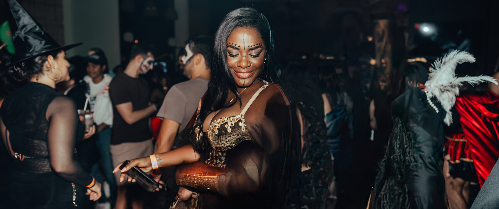woman in costume at Grand Roatan Halloween Party